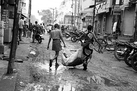 In black and white, this photo series lays bare the hard truths of manual scavenging