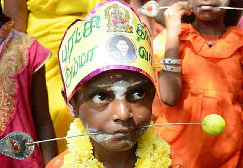 Pierced cheeks to bare chested girls: How far can use of kids in religious rituals be condoned?