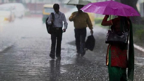People standing in the rain | Image for representation only