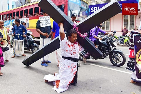 Pleading for justice for his dead daughter, father drags cross in Kerala's capital city