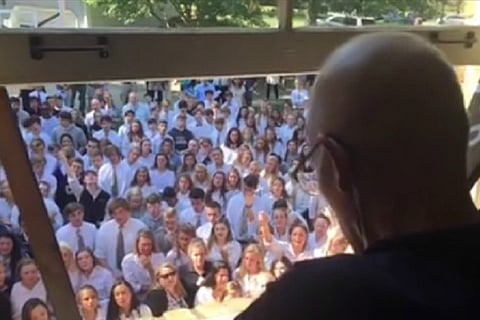 Watch: Touching video of 400 students singing for their cancer-stricken teacher