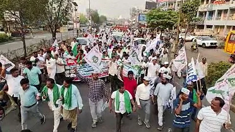 Vizag steel plant workers taking out a rally