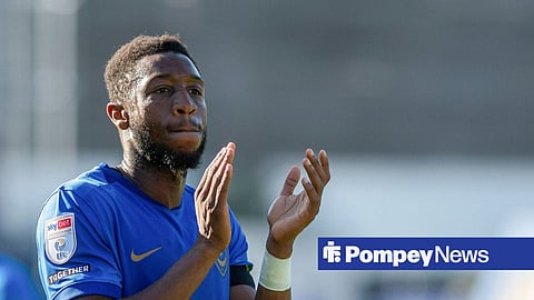 Ebou Adams applauding Portsmouth fans