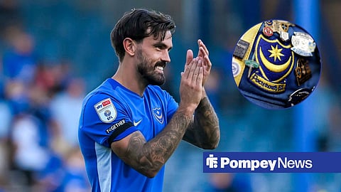 Marlon Pack applauds the crowd at Fratton Park, alongside a smaller picture of a Portsmouth logo on a cap surrounded by badges.