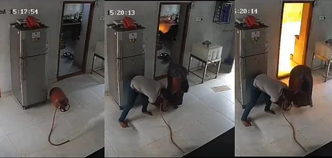 എൽ.പി.ജി ഗ്യാസ് സിലിണ്ടർ ചോർന്ന് സ്ഫോടനം; സ്ത്രീയും പുരുഷനും അത്ഭുതകരമായി രക്ഷപെടുന്നതിന്റെ തത്സമയ ദൃശ്യങ്ങൾ പുറത്ത്... വീഡിയോ | LPG gas
