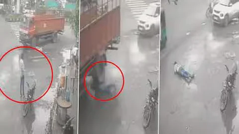 ഓടുന്ന ട്രക്കിന്റെ ചക്രങ്ങൾക്കടിയിലേക്ക് ചാടി യുവാവ്; ഞെട്ടിക്കുന്ന ദൃശ്യങ്ങൾ കണ്ട് നെറ്റിസൺസ്, വീഡിയോ | truck