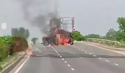 Acid truck overturns