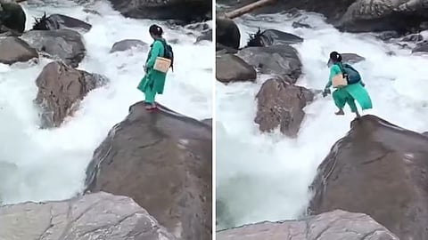 Health worker crosses river