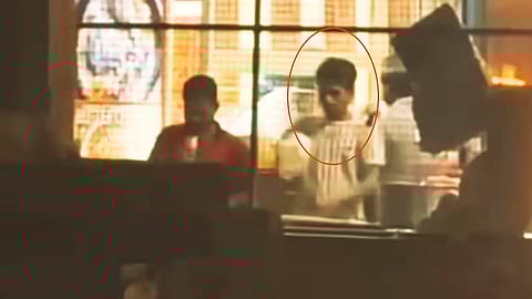 cook spitting on roti