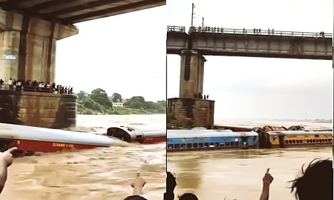 train being swept away in flood