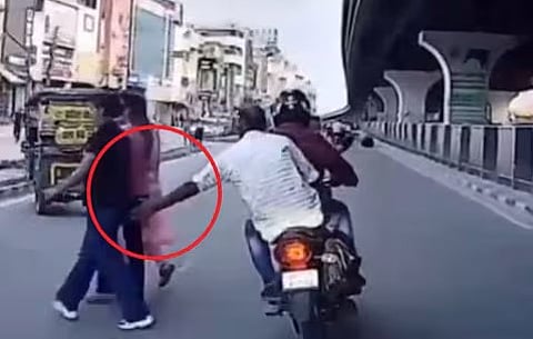 two-wheeler rider inappropriately touching women
