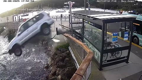 Woman drives car through ferry terminal