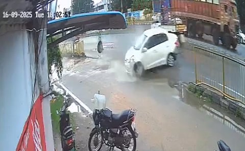 car crashes into railing