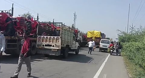 factory worker being hit by a bus