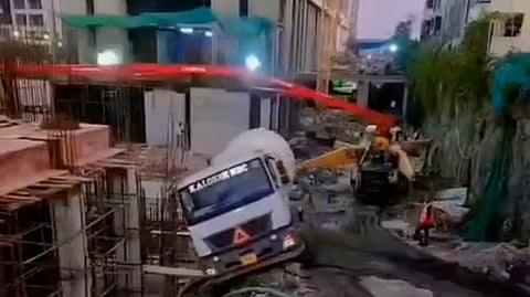 RMC truck overturns