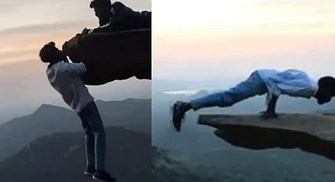 പാറയുടെ മുകളില് നിന്ന് റീല്സ് ചിത്രീകരിച്ച് യുവാവ്: പിടിവിട്ടാല് 800 അടി താഴ്ച്ചയിലേക്ക്, വീഡിയോ | Man arrested for shooting reels on Avalabetta cliffs