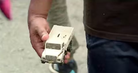 അർജുൻ്റെ ലോറിയിൽ കുഞ്ഞുകളിപ്പാട്ടവും, ഫോണും, വാച്ചും, പാത്രങ്ങളും: ബാക്കിയായത് ഹൃദയഭേദകമായ കാഴ്ച്ചകൾ | Toy car found in Arjun’s lorry