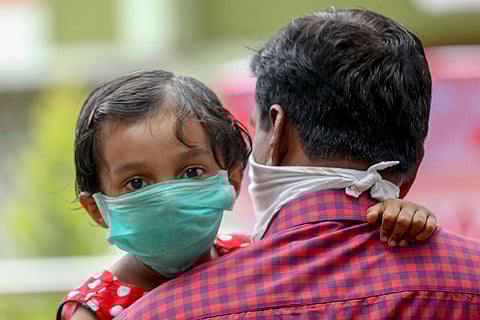 Child wearing mask