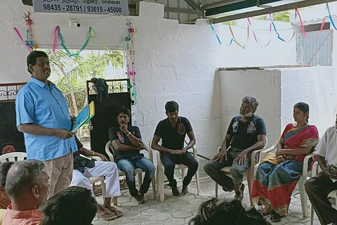 A group of AKS members sitting in a chair in circle in a event supporting inter-caste marriages in Tamil Nadu