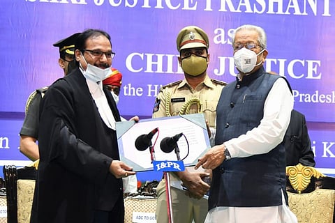 Justice Mishra with Governor Biswabhusan during sworn in ceremony