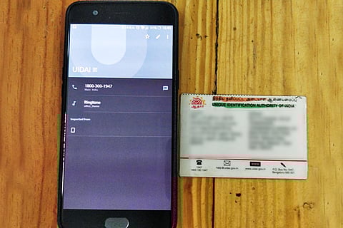 People find UIDAI number auto-stored on phone, authority shirks responsibility