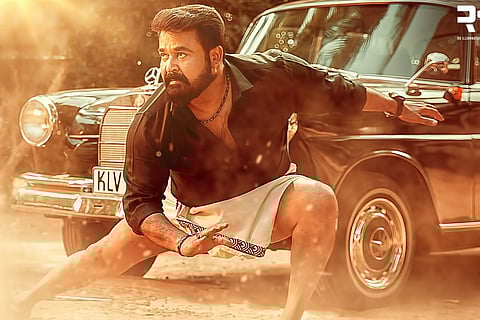 Mohanlal in black shirt and veshti with a black mercedes in the background