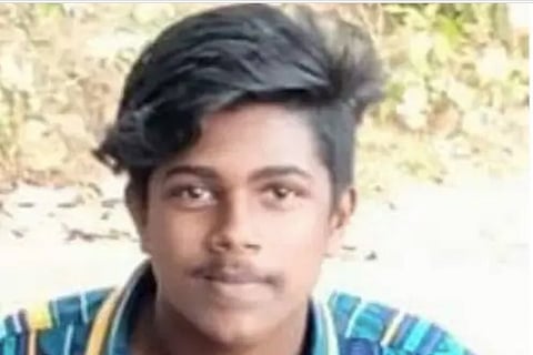 Boy in a green striped shirt