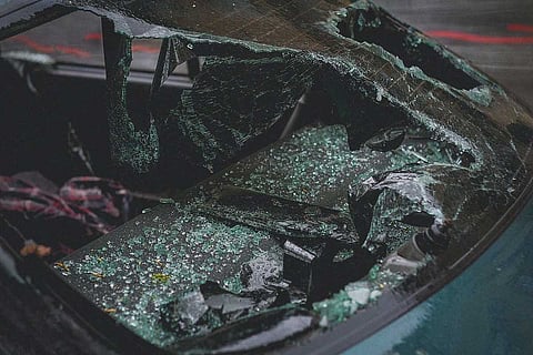 A car with its window smashed