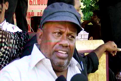 Veteran actor Senthil is seen wearing a white shirt and blue cap in the image.