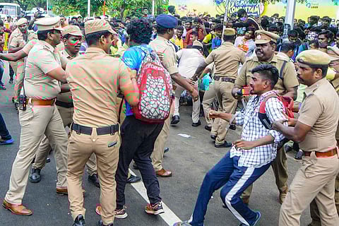 Police in Chennai detaining people protesting against the Agnipath scheme