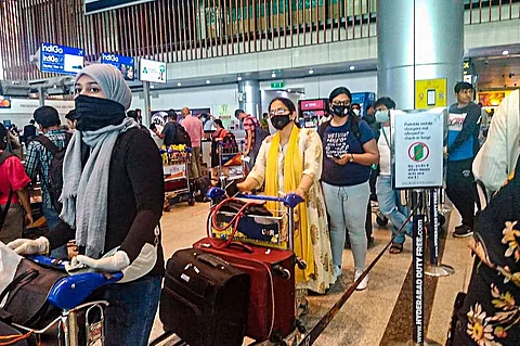 People in a queue at the airport