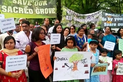 Parishioners and activists protesting the church land being acquired by the BMRCL