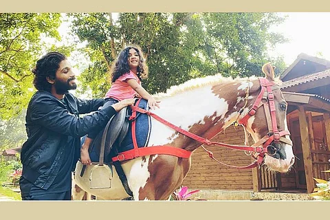 All Arjun with his daughter Arha, seated on a horse