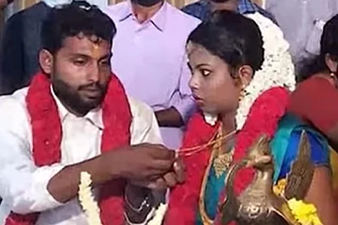 Amala and Ranjith at their wedding
