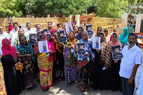 Family members of Ameer Nisha, protest in front of the District Collector's office in Thoothukudi