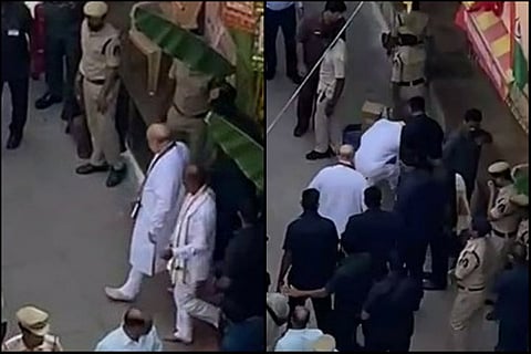 Bandi Sanjay picking up Amit Shah’s footwear