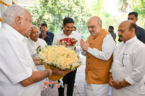 Union Home Minister Amit Shah being welcomed at Yediyurappa's residence