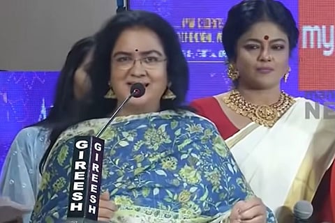 Actor Urvashi speaking at AMMA Women’s Day event