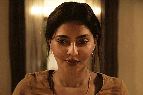 Aishwarya Lekshmi as Ammu, in a still from the Telugu film Ammu