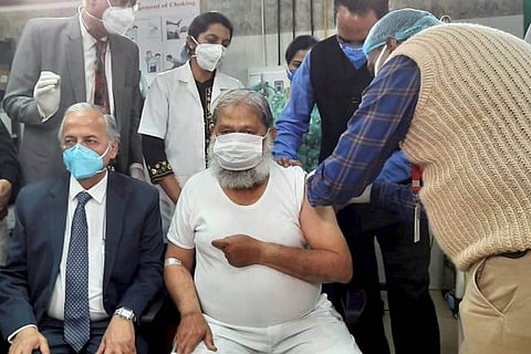 Anil Vij taking Covaxin shot