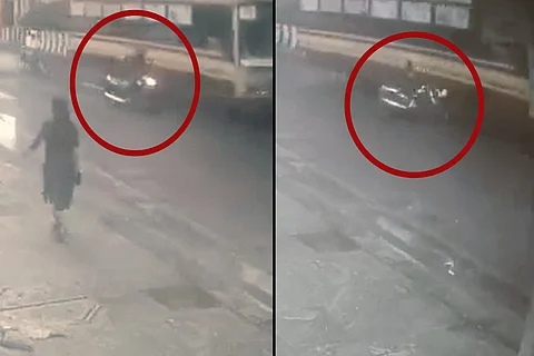 Collage of bike skidding over pothole in Anna Salai