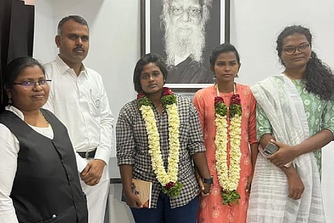Arun and Aruna along with lawyers who helped with their marriage