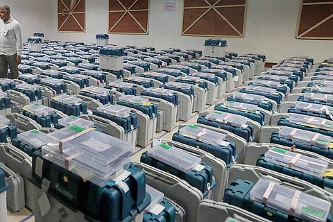 Several EVM machines in a room