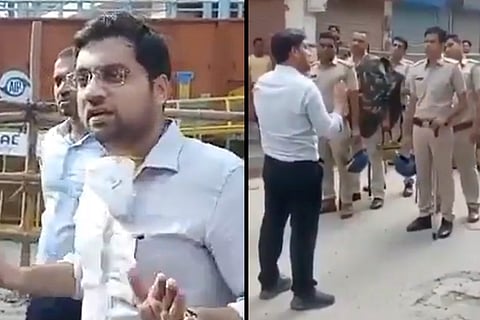 A screengrab from the video showing IAS officer Ayush Sinha telling police to 'break heads' of the farmers