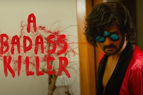 Prabhu Deva wearing red robe and three lens sunglasses in Bagheera poster