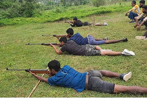 Bajrang dal members seen holding air guns during the event in Karnataka