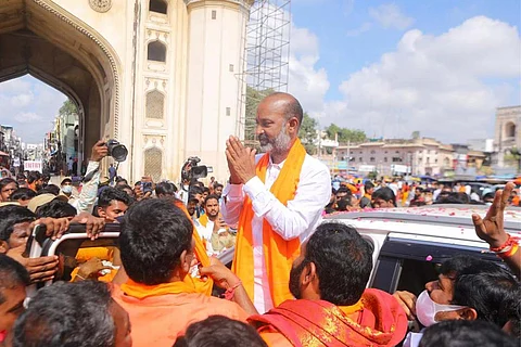 Bandi Sanjay greeting people at Charminar