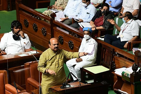 Karnataka Chief Minister Basavaraj Bommai wearing a green dress and speaking in Assembly