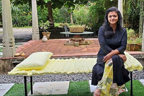 Lakshmi who made bedrolls made from PPE scrap