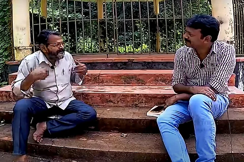 A video grab of the Behindwoods interview where the anchor (right) is interviewing Maniyan Pillai, the thief (Left). 